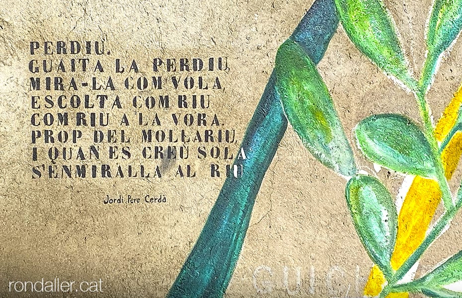 Mural amb un poema de Jordi Pere Cerdà, conegut com Antoni Cayrol a la Place du Souvenir.