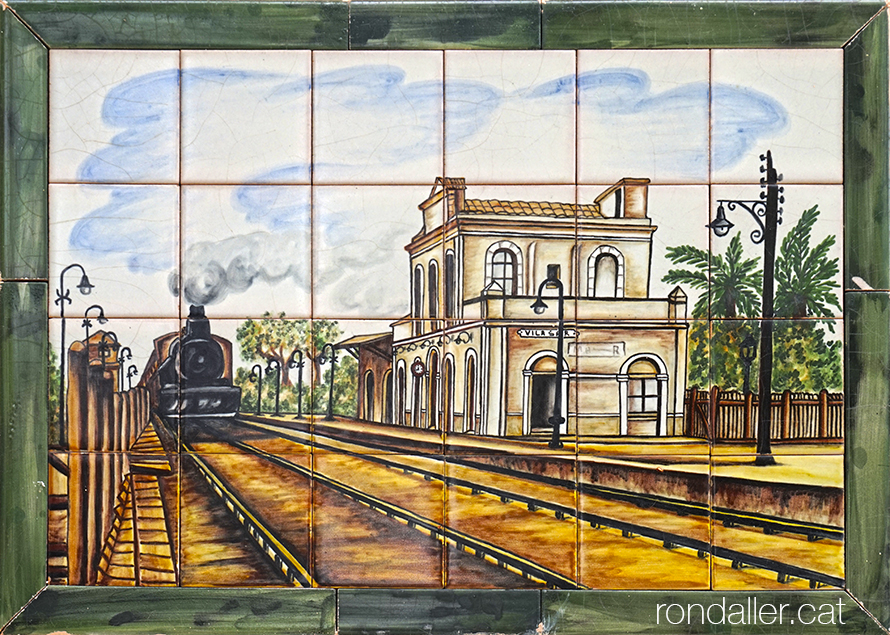 Plafó ceràmic amb la imatge de la primera estació de trens de la vila.