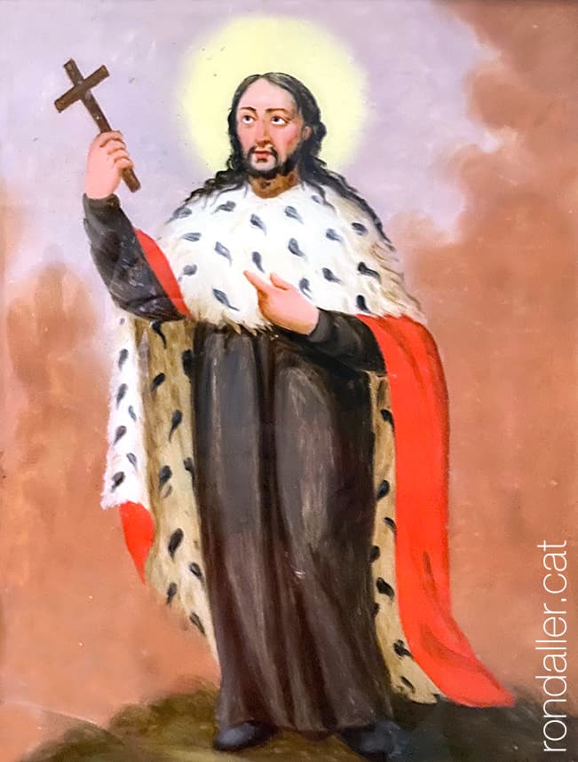 Quadre devocional del Diví Salvador vestit amb una capa.