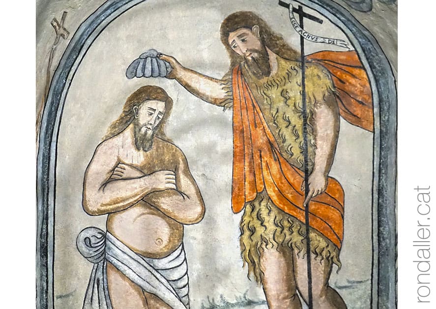 Pintura mural representant Joan Baptista batejant Jesús.