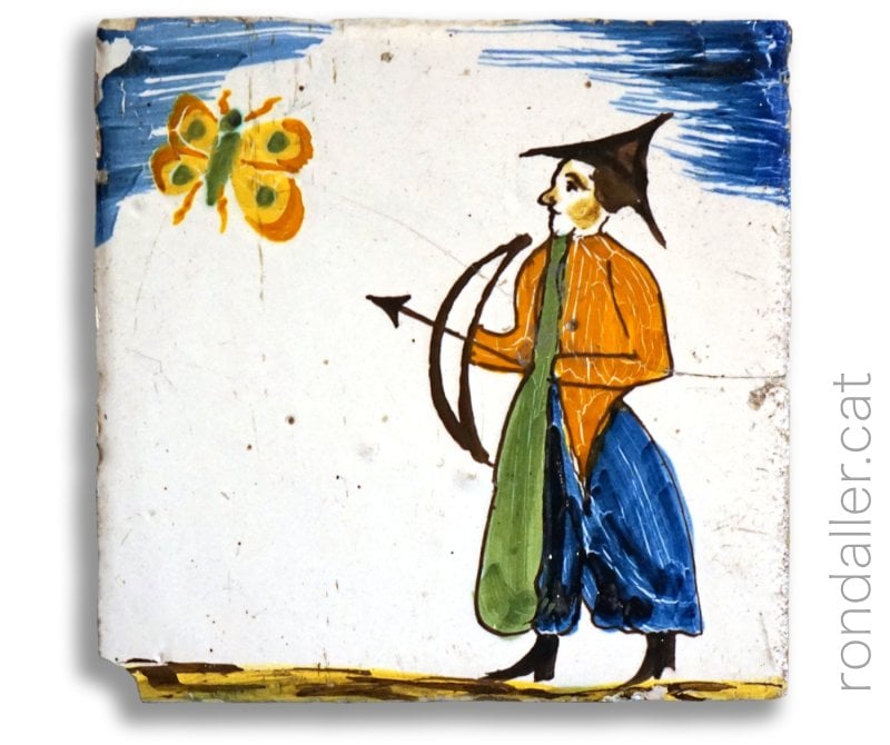 Rajoles d'oficis amb motius orientals. Representació d'un personatge oriental caçant una papallona.