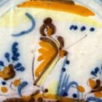 Rajoles d'oficis amb motius orientals. Geisha en un jardí.