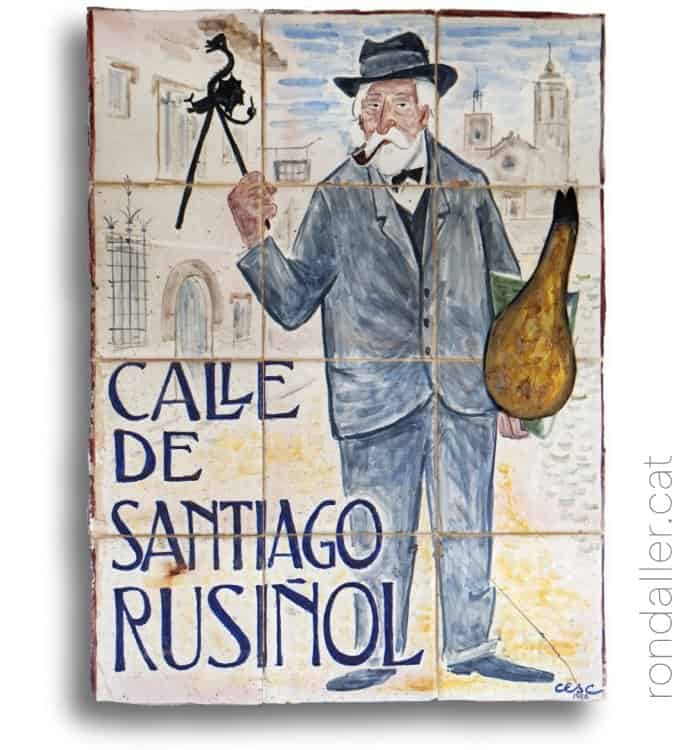 Elements ceràmics a Sitges. Plafó al carrer de Santiago Rusiñol fet pel caricaturista Cesc.