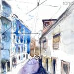 Aquarel·la amb una vista d'un carrer del nucli antic de Lisboa.